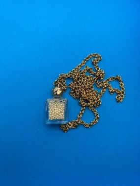 Goldstone Necklace With Small Pearl perfume bottle